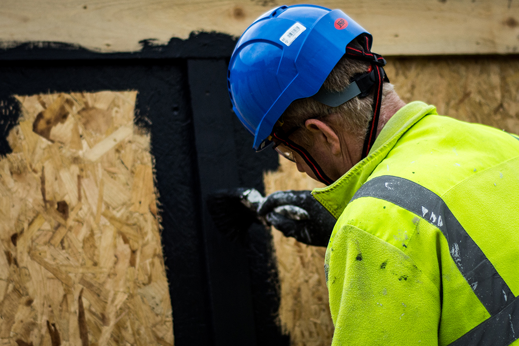 older worker in hard hat