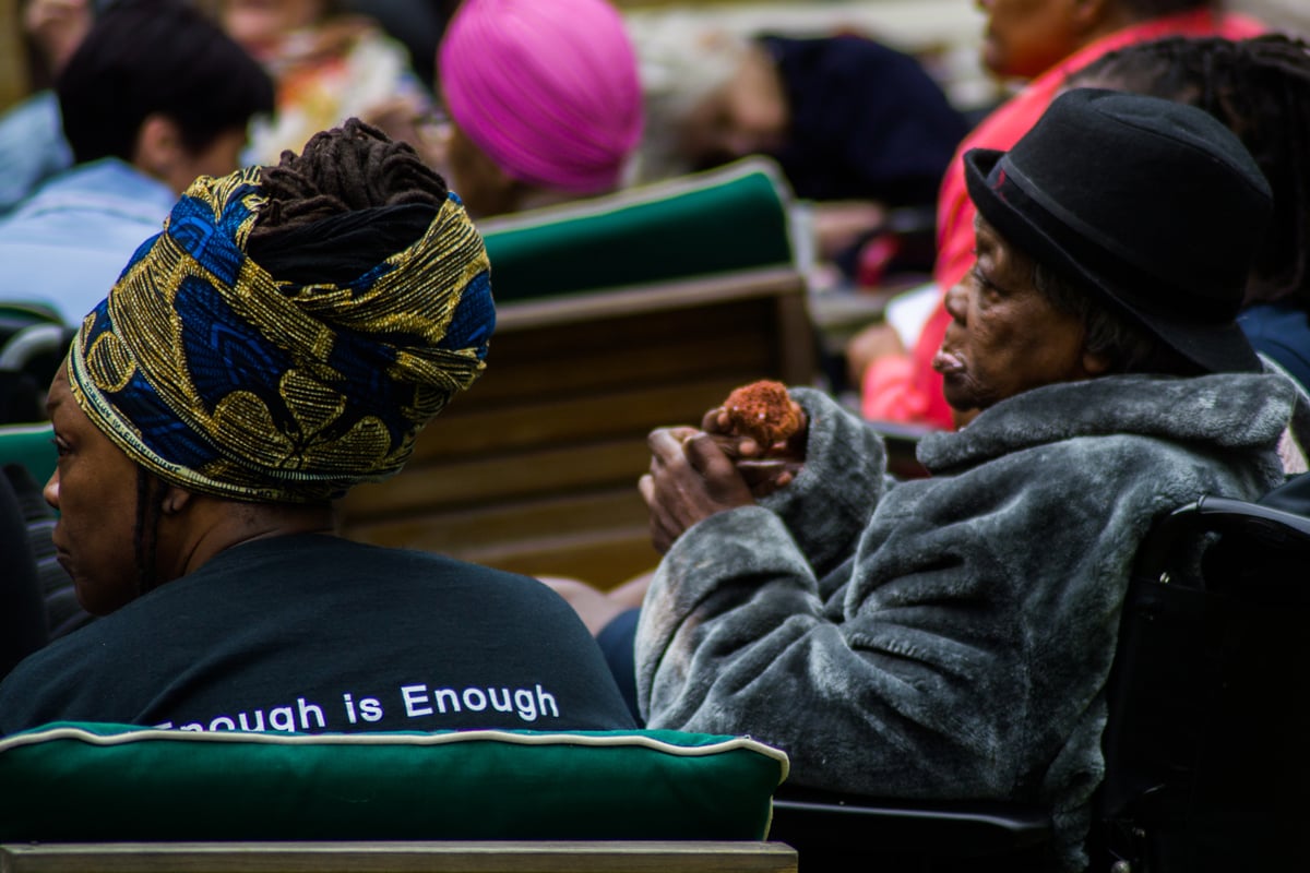 Two women celebrating care home open day
