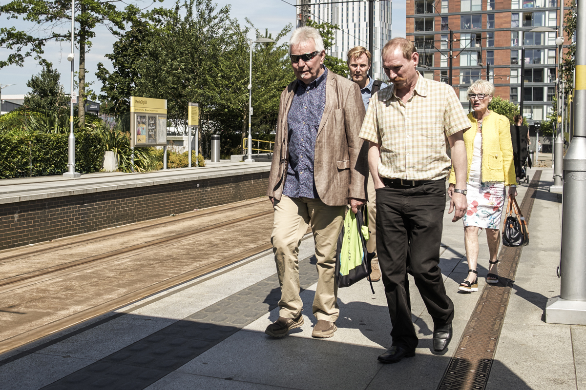 Commuters, Media City tram station, Manchester