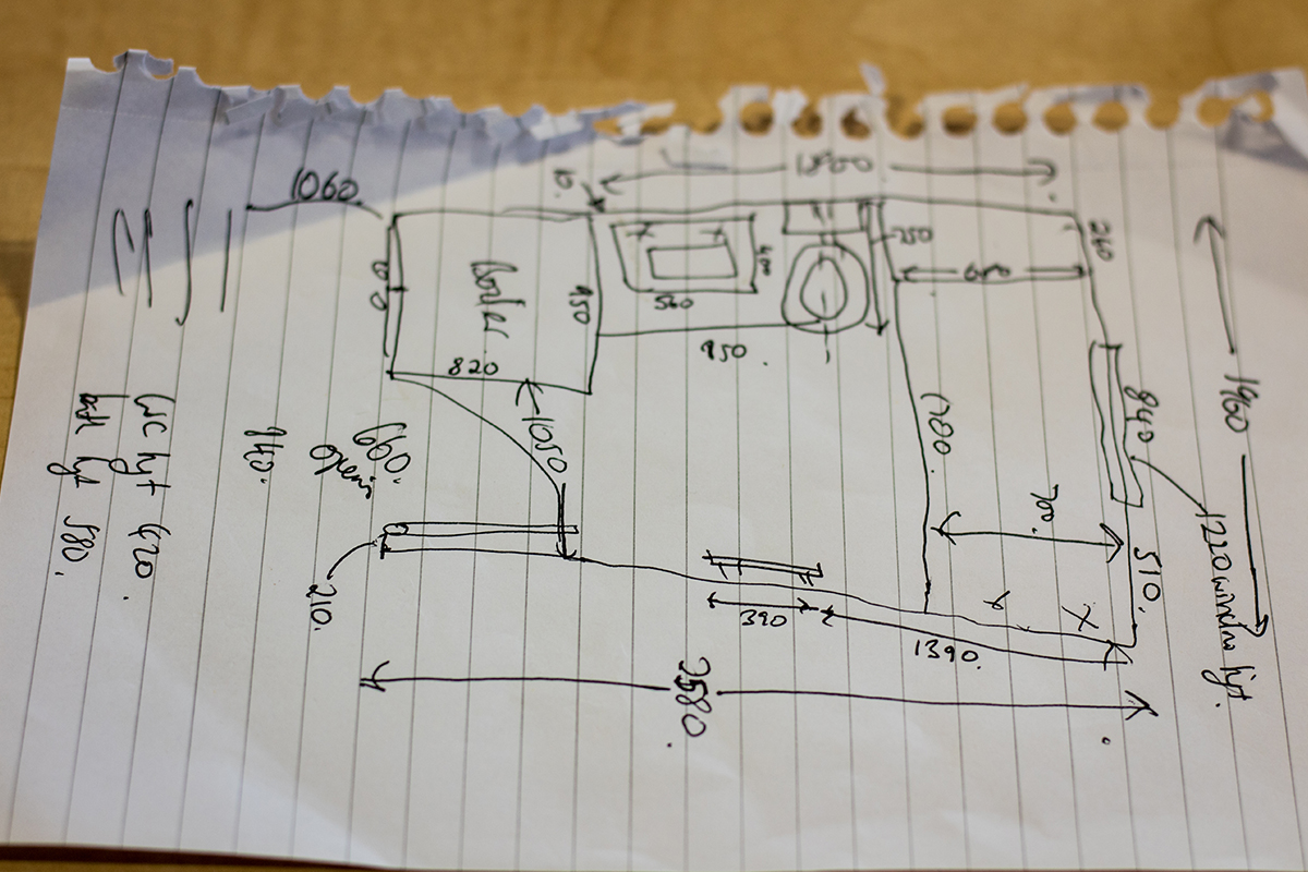 Hand drawn plans on a piece of paper.