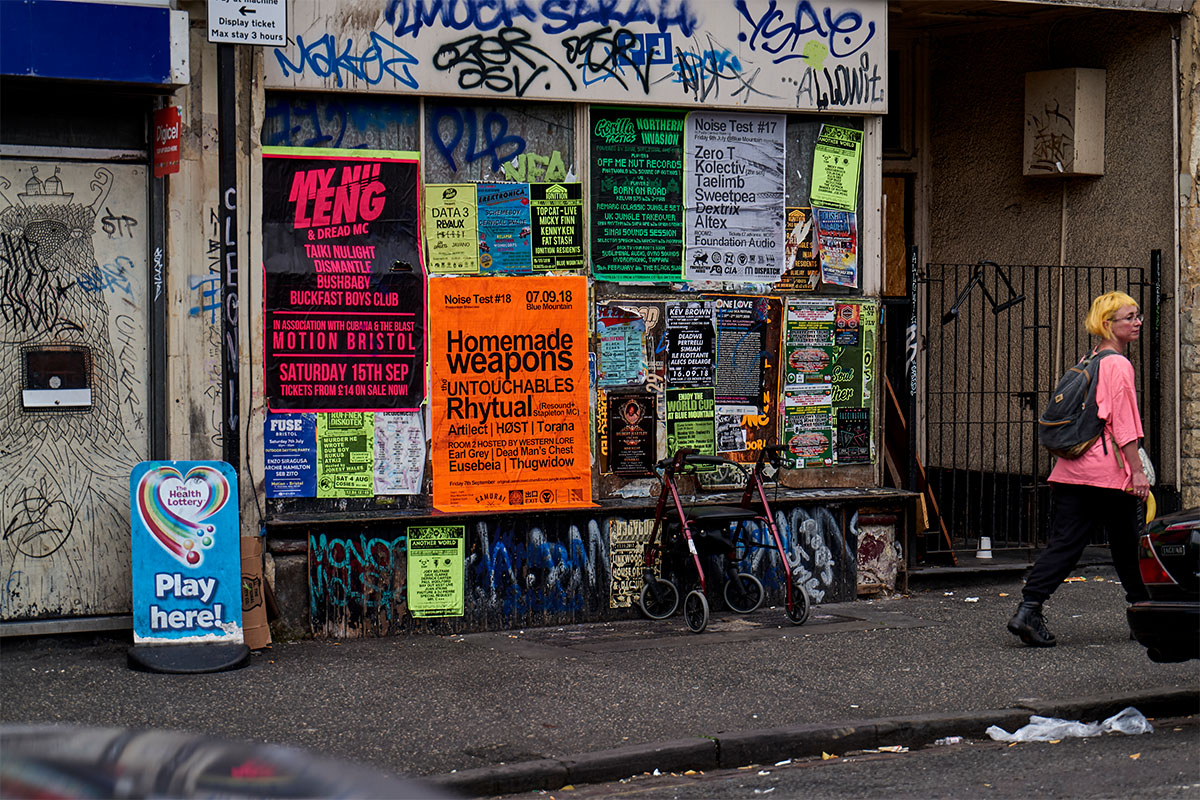 Woman in front of building