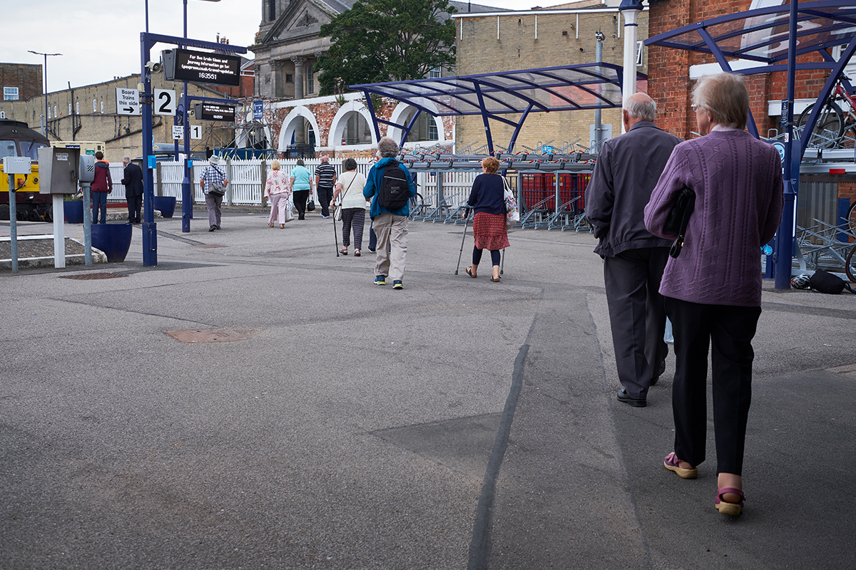 Older people at train station