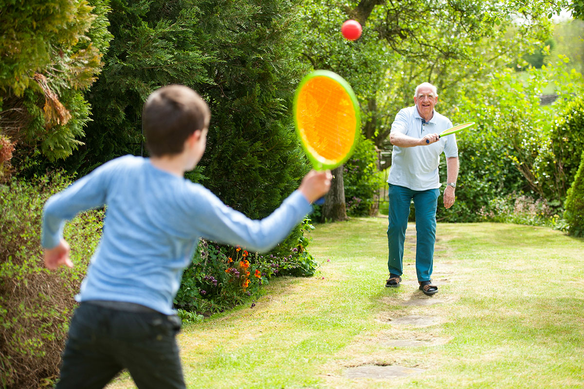 Grandson and Grandfather playing