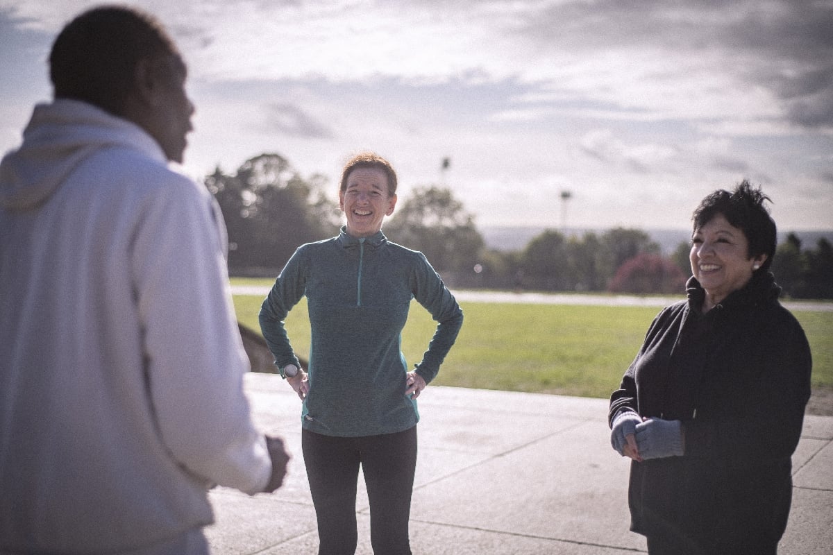 Group of older adults exercising outside