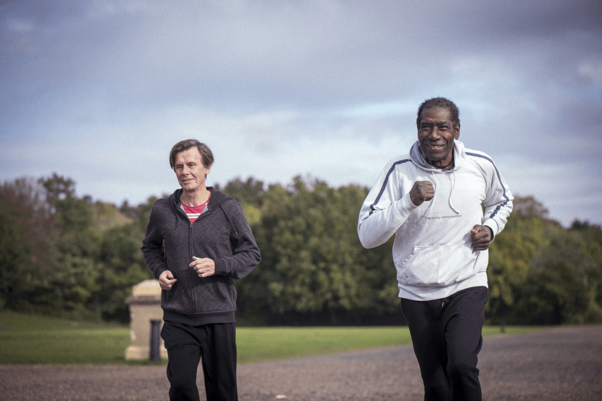 Two older men exercising outdoors