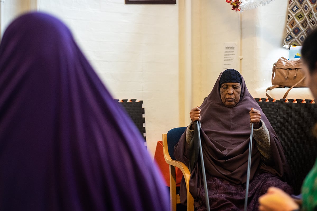 Older woman using resistance band