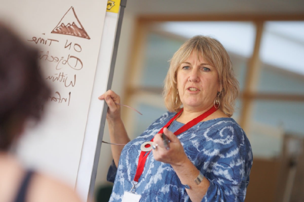 older woman teaching