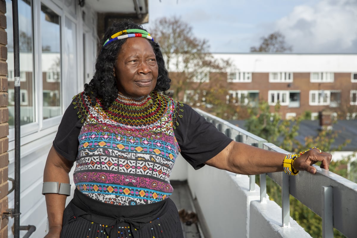 an older black woman smiling at the camera