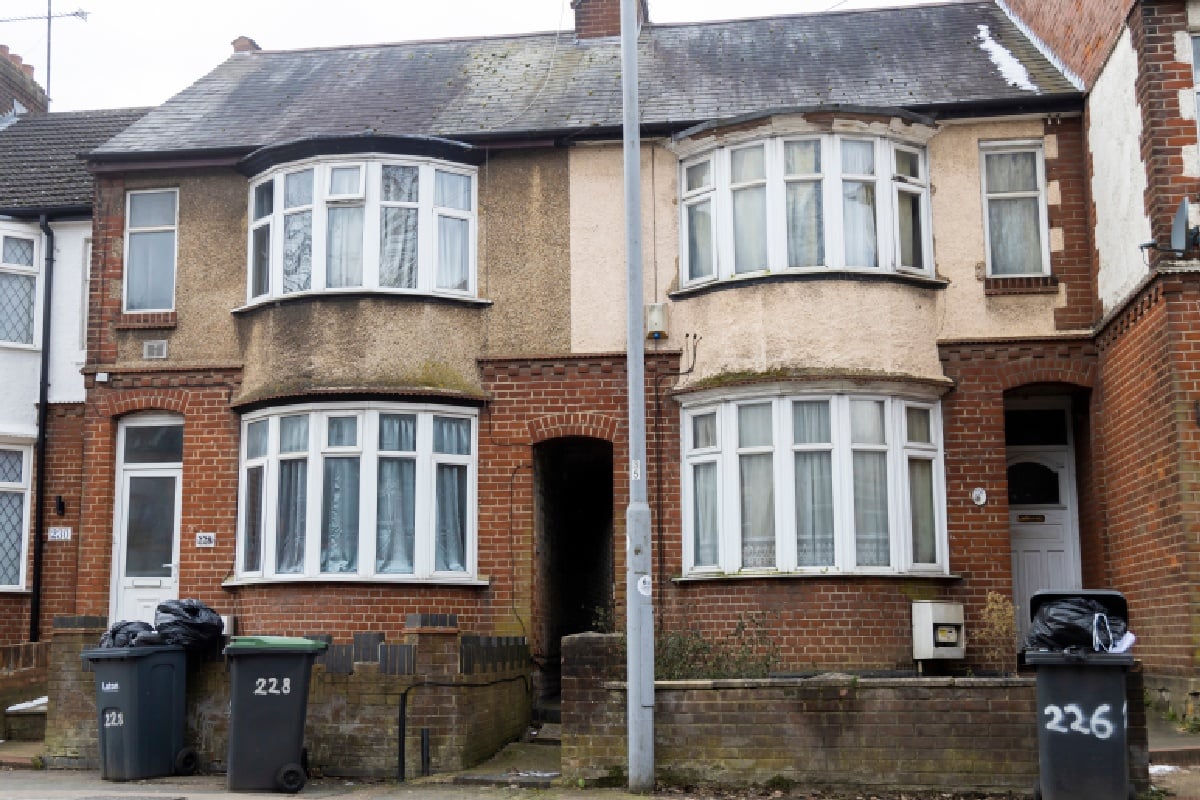 A row of houses with bay windows