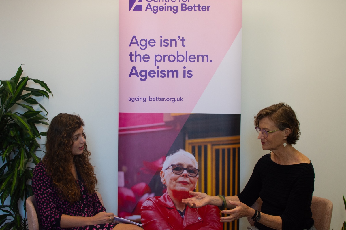 Ashton and Jo sitting down and talking