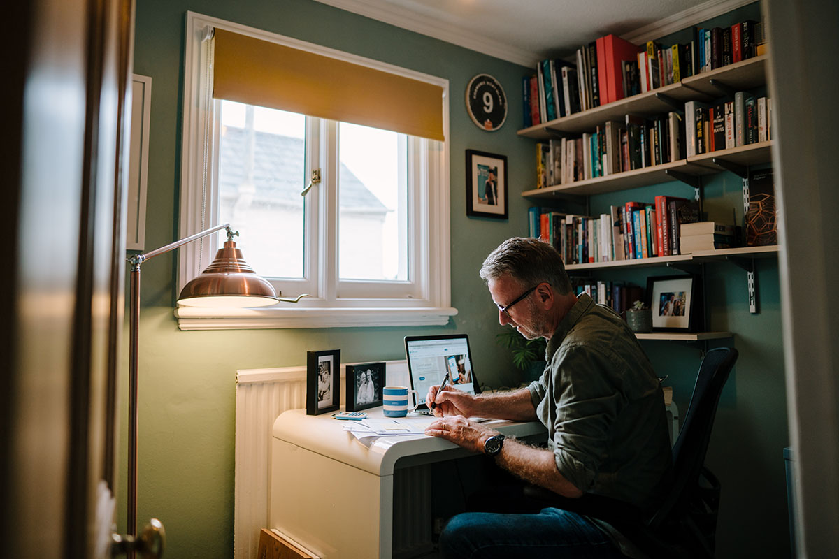 Older man working in a home office