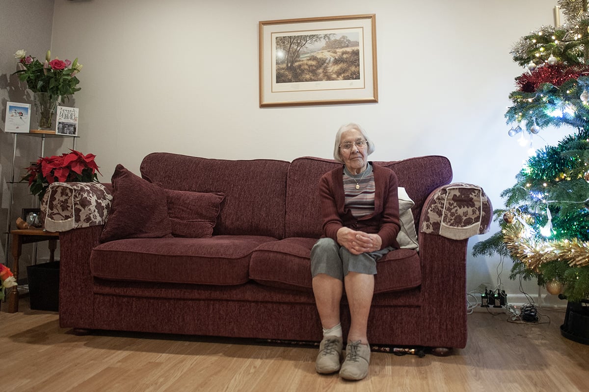 Older-woman-on-sofa