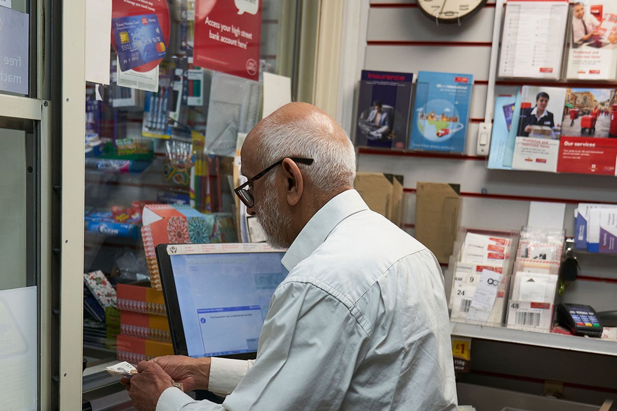 Older-man-working-in-post-office