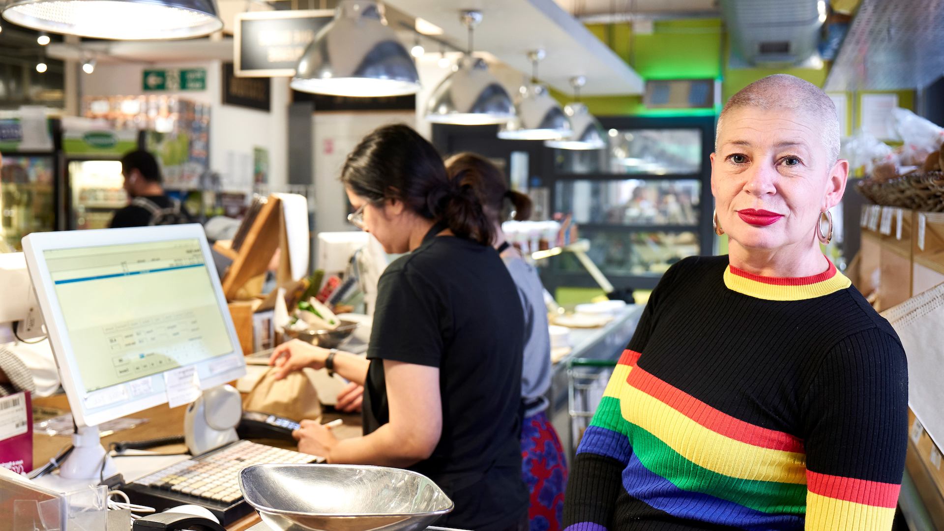 woman behind the counter in a shop