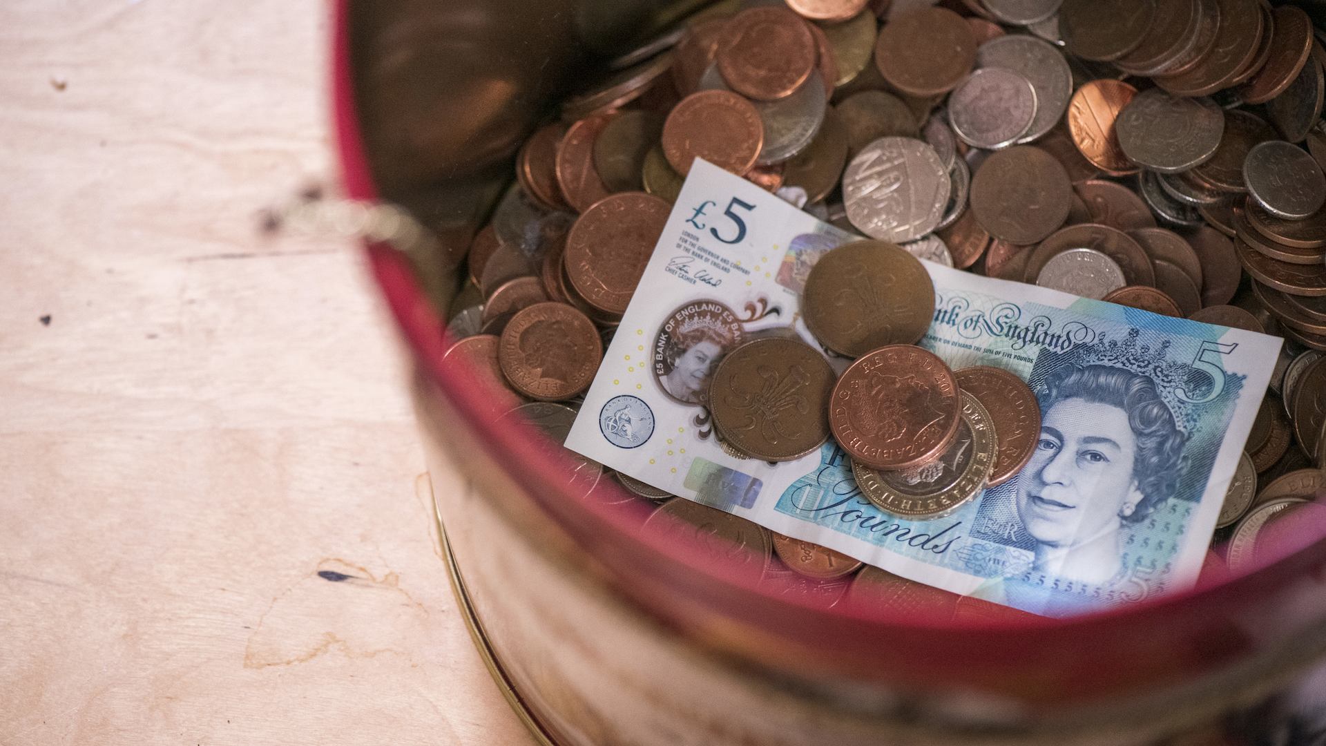 A tin of money