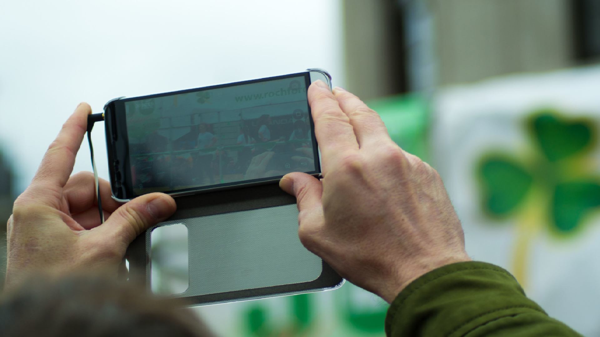 man holds phone