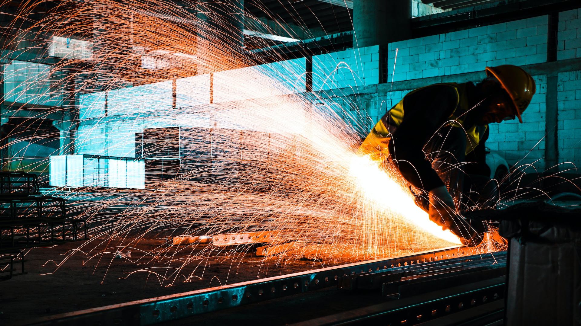 Worker using welding machine