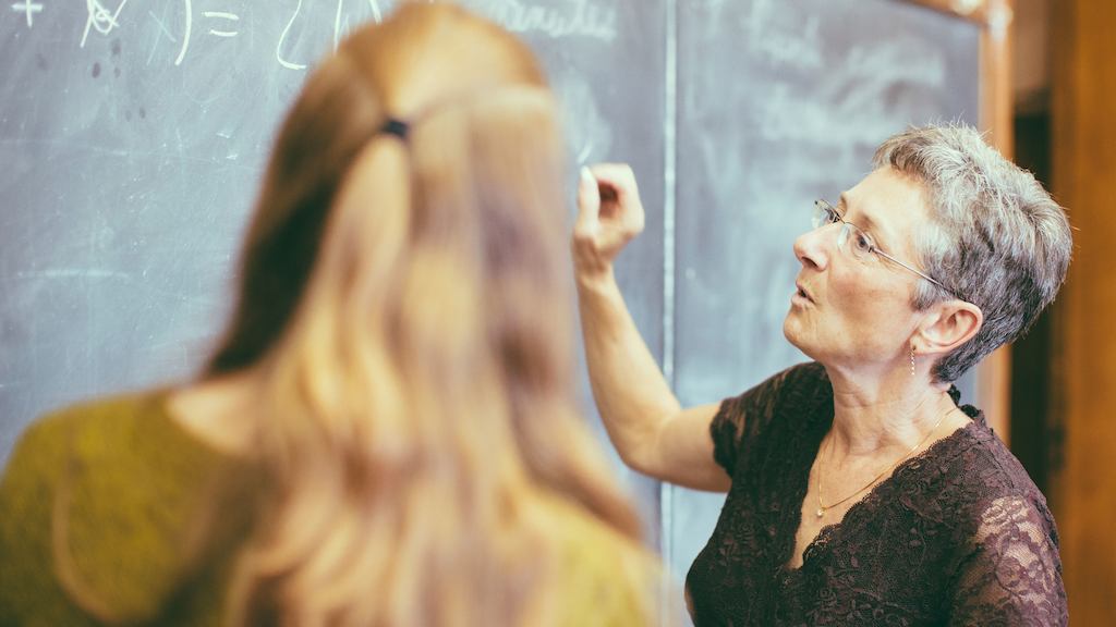 teacher using whiteboard