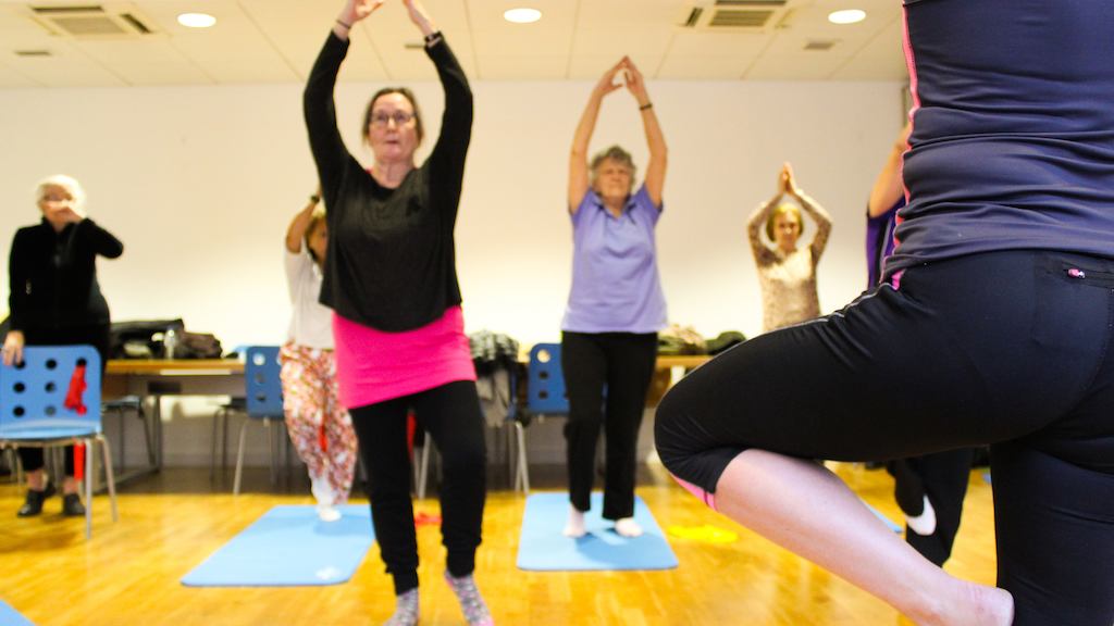 woman balancing in yoga class