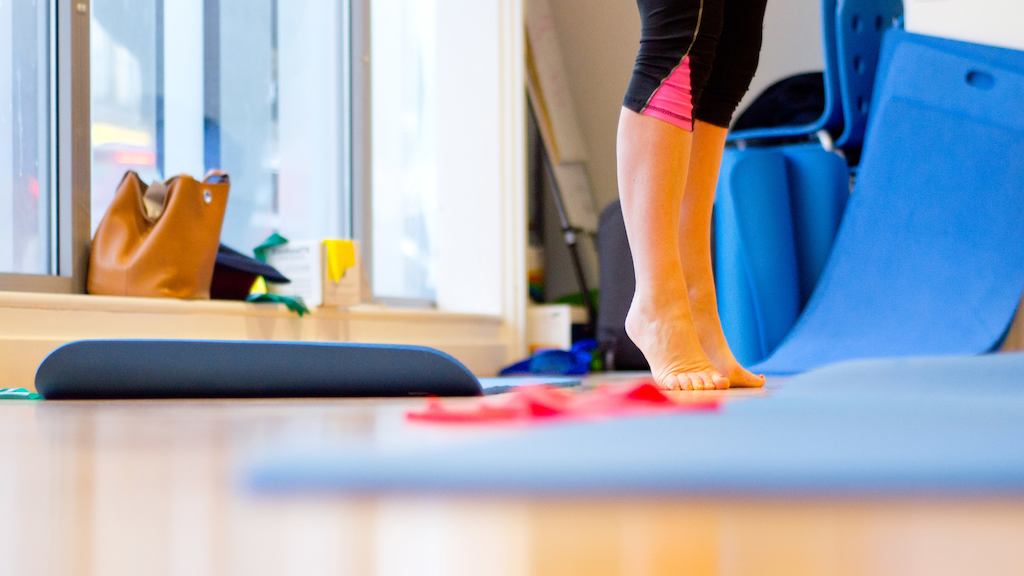 woman balancing in yoga class