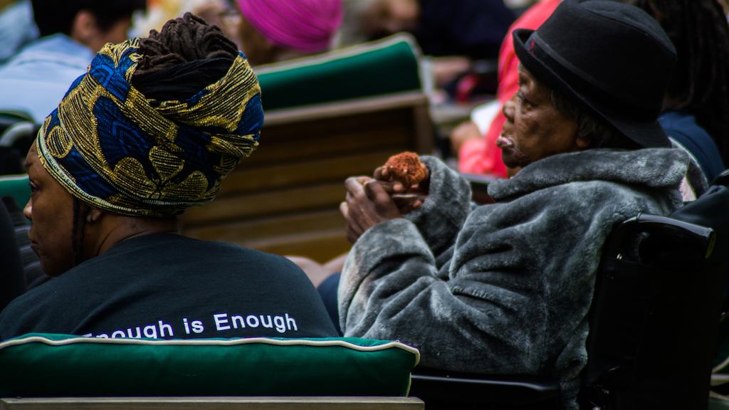 Two women celebrating care home open day