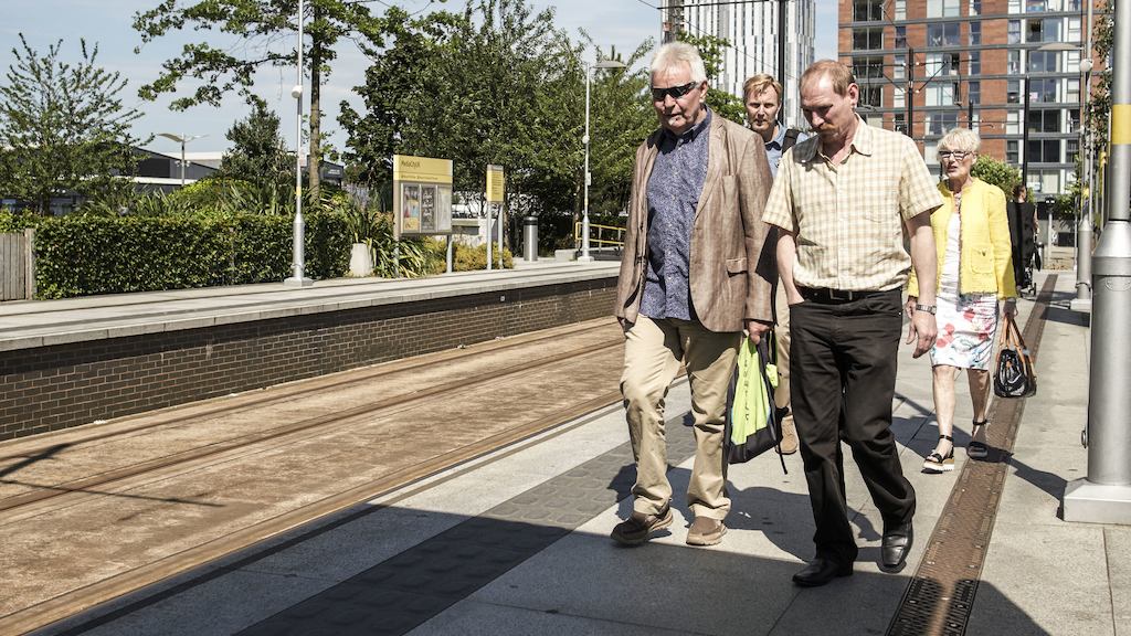 Commuters, Media City tram station, Manchester