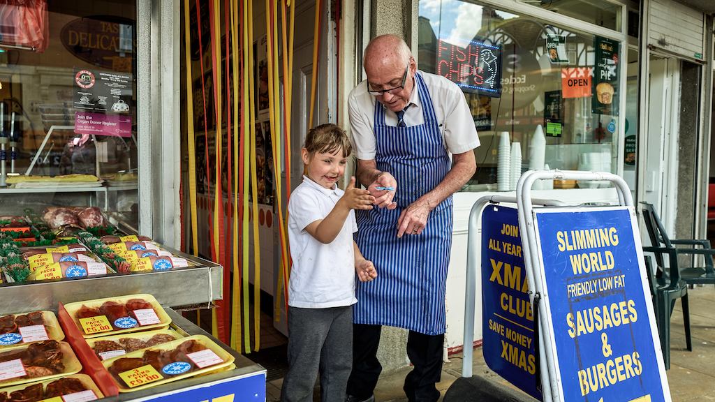 Butcher with young boy