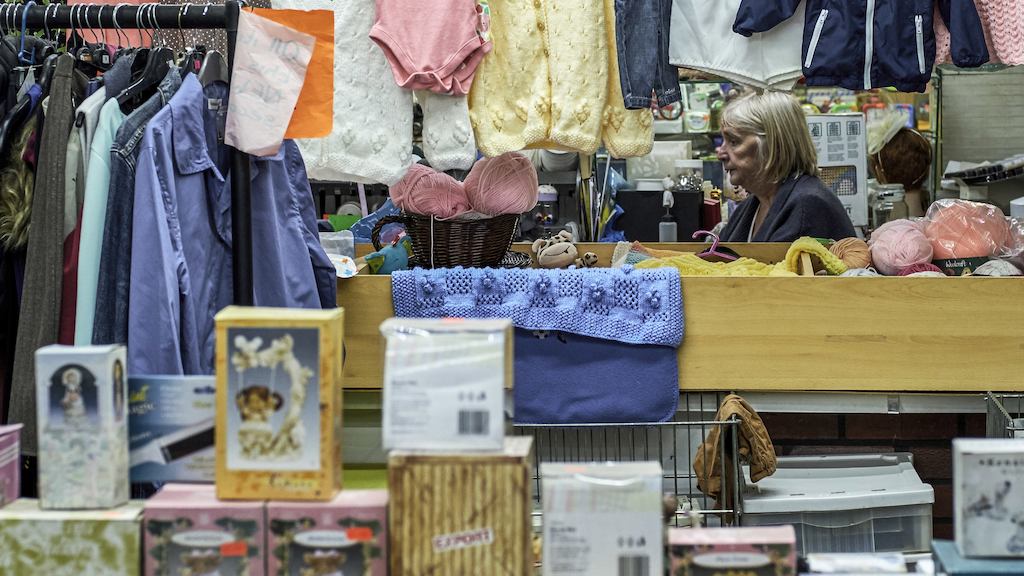 Woman shopping in Eccles, Greater Manchester
