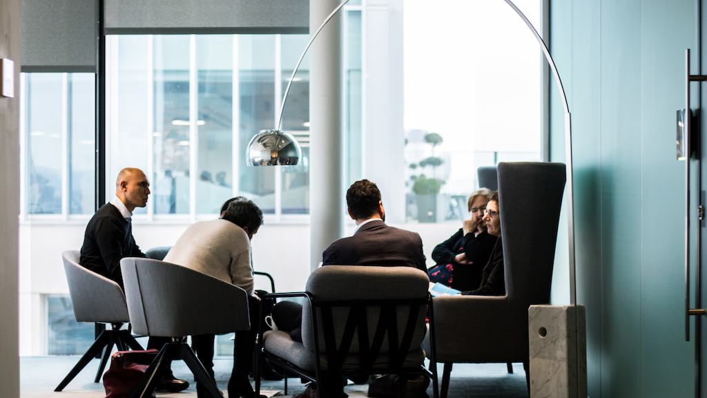 Group of people sitting in a business environment