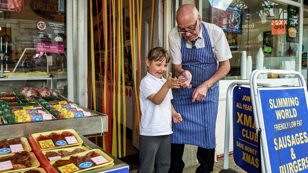 Butcher with young boy