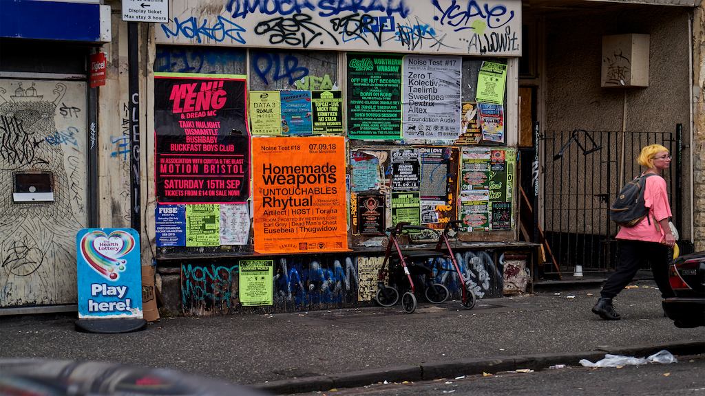 Woman in front of building