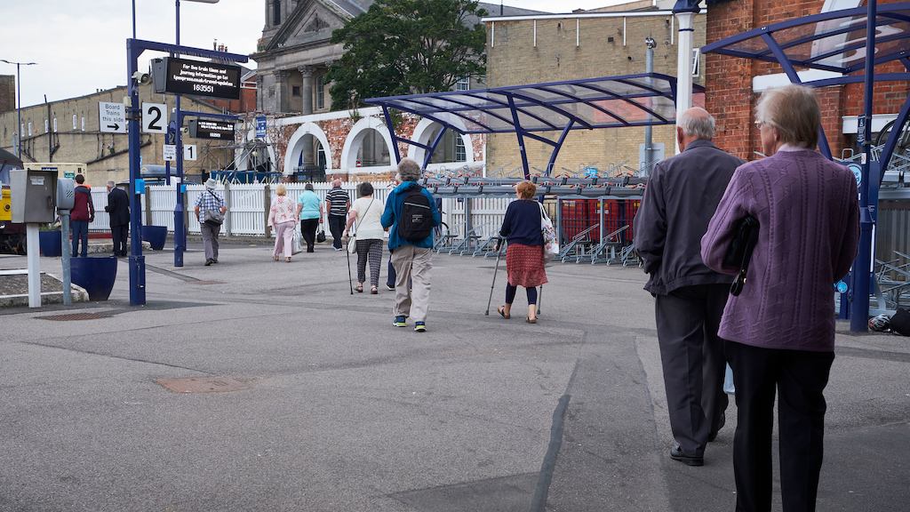 Older people at train station