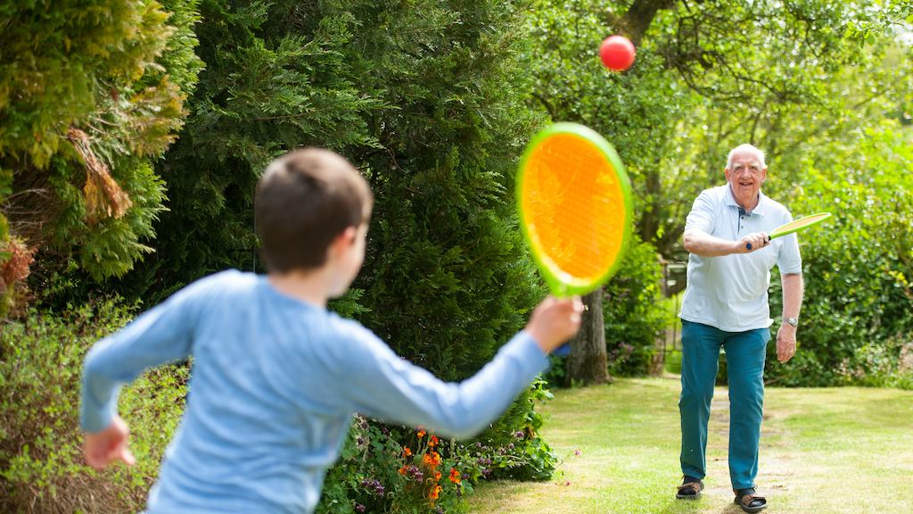 Grandson and Grandfather playing 