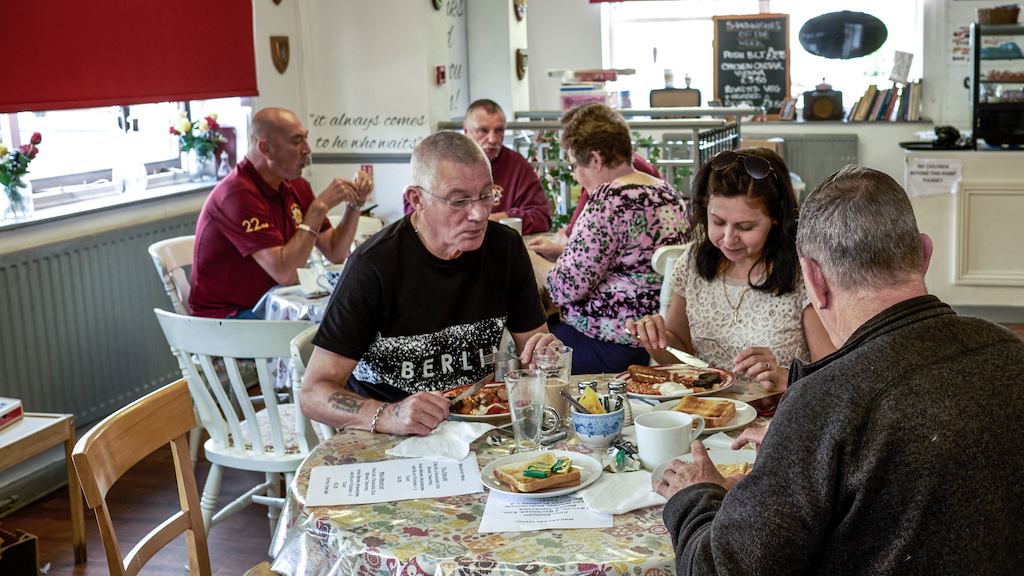 Cafe customers conversing
