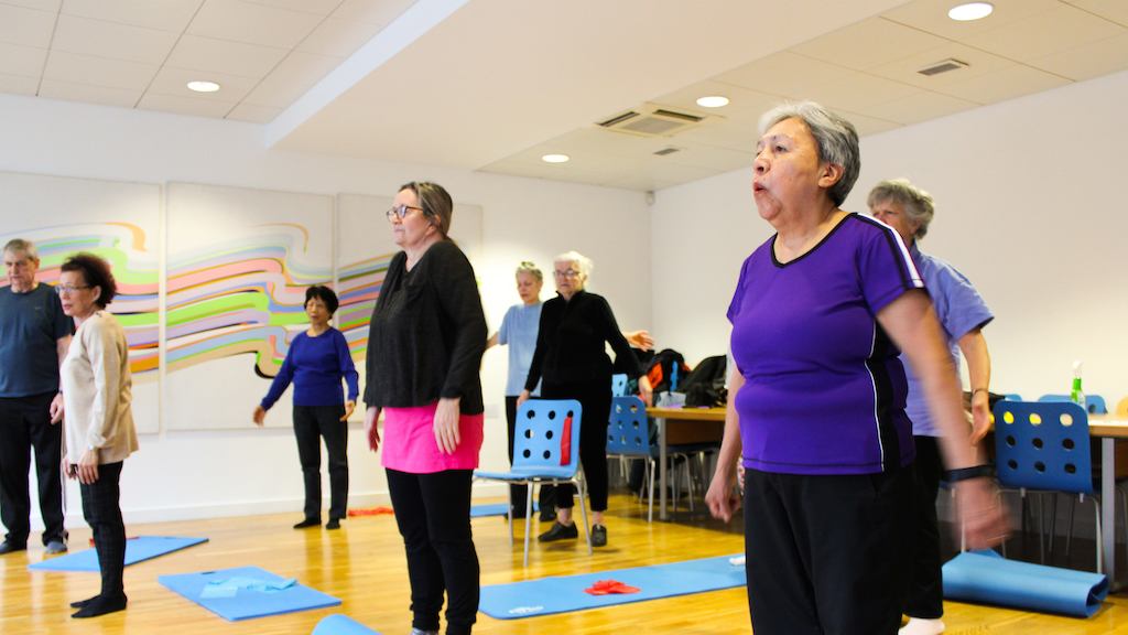Older people in yoga class