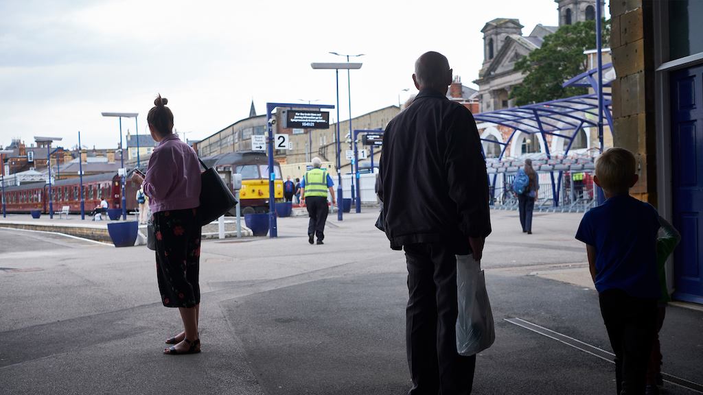 People at a train station