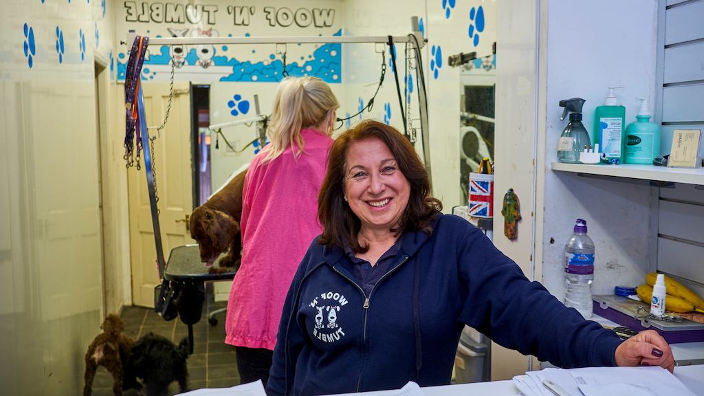 Older worker looking into camera