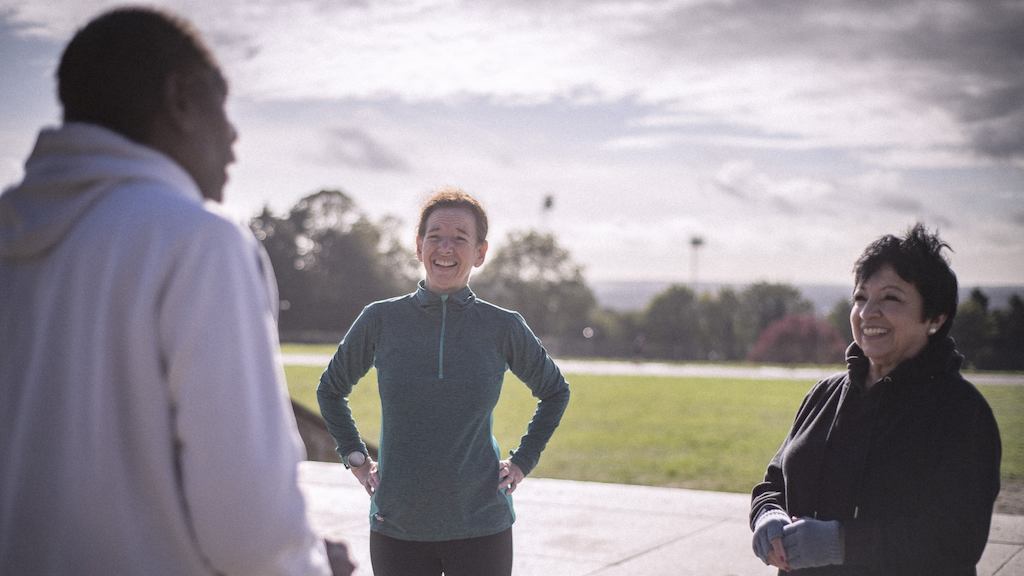 Group of older adults exercising outside