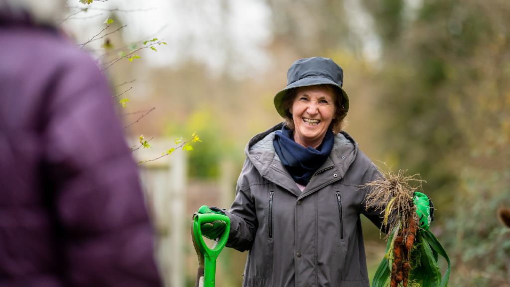 older woman gardening