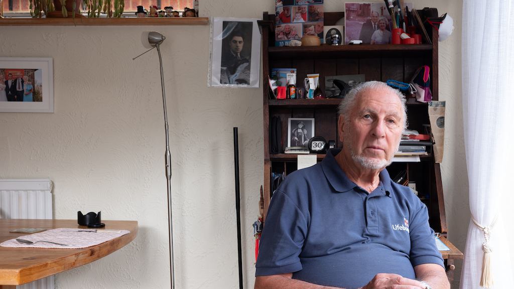 older man sitting down