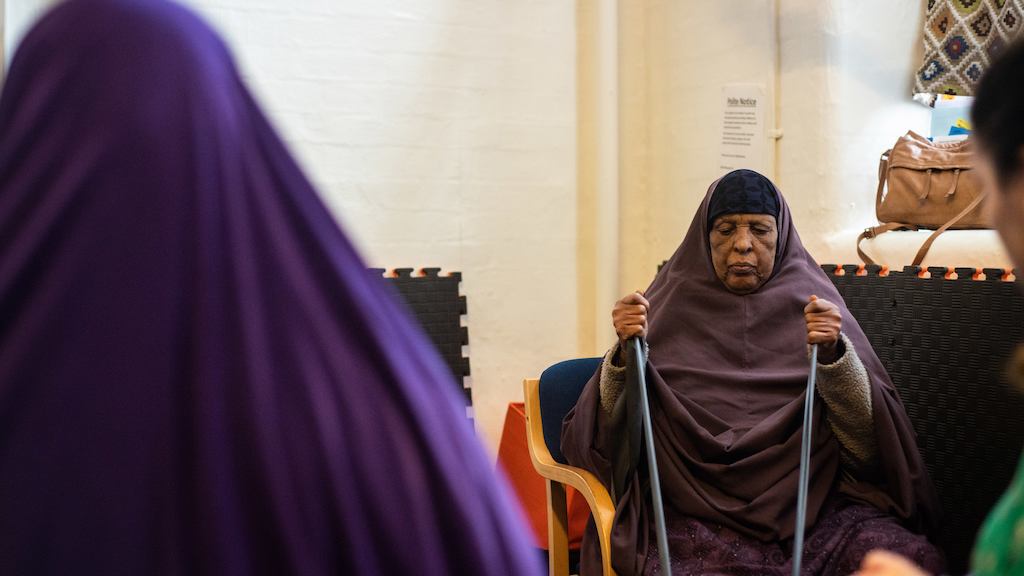 Older woman using resistance test