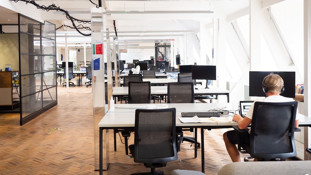 man working in empty office