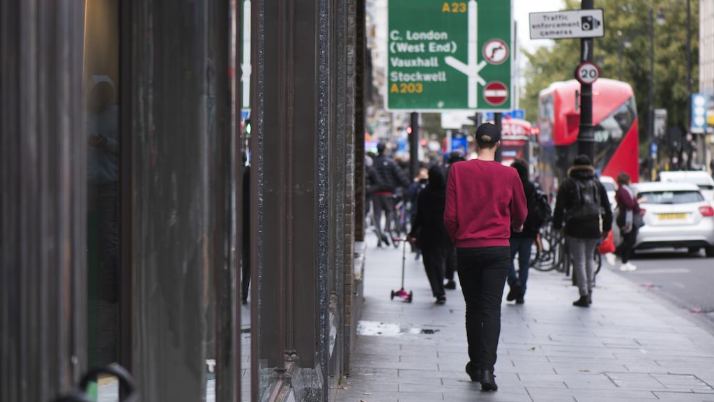 people walking down a street