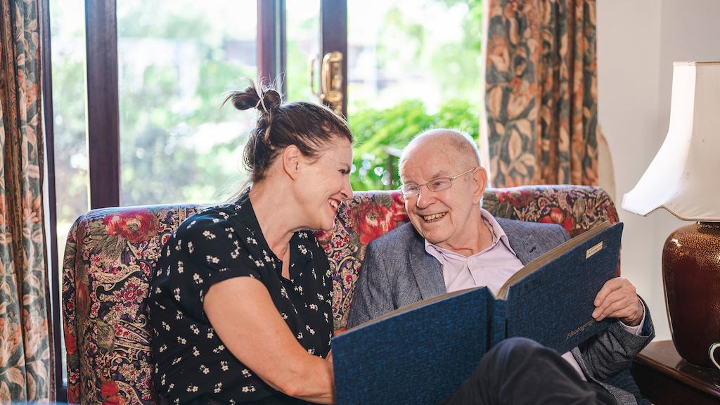 woman caring for her father
