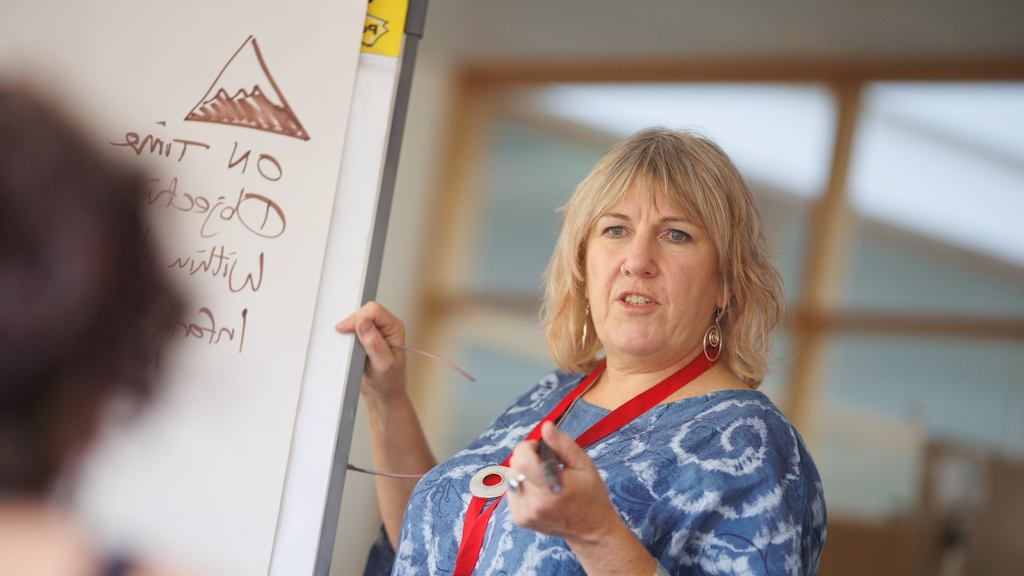 older woman teaching