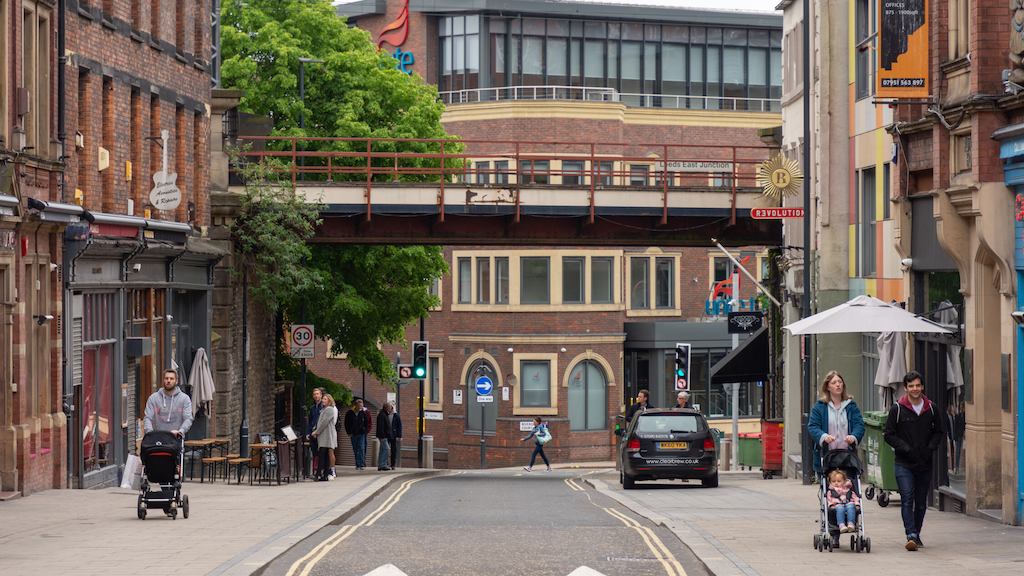 Street with people walking down