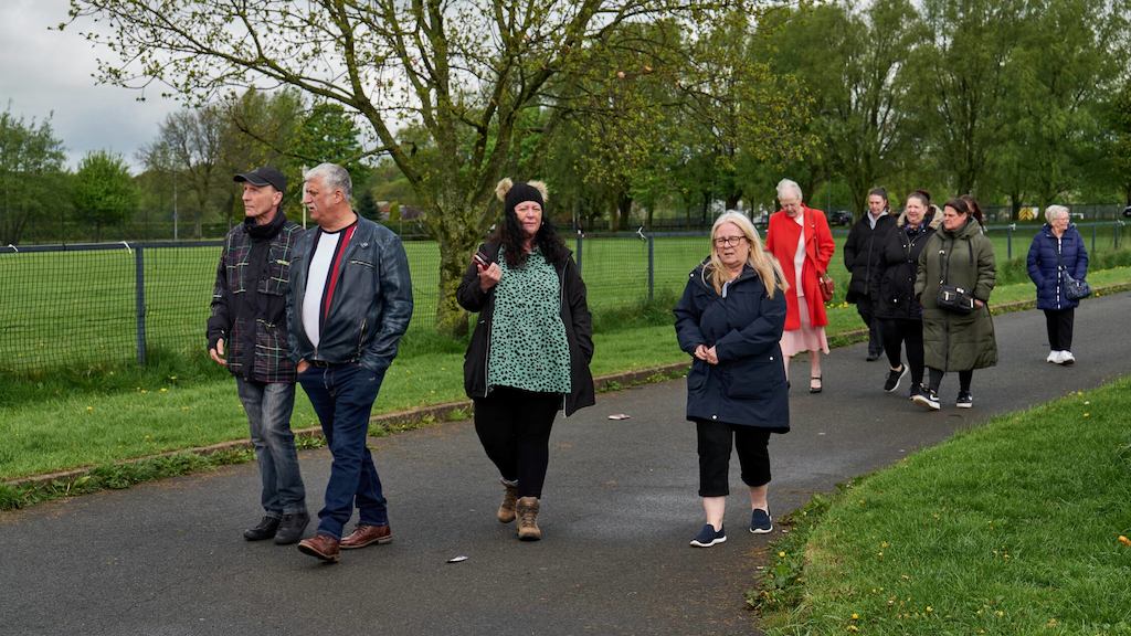 People walking along a road