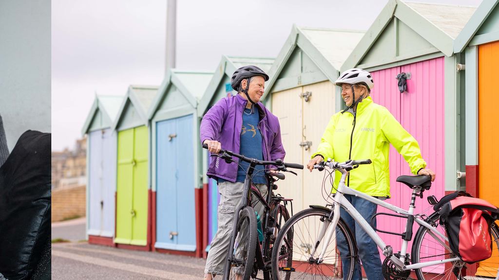 Two people cycling