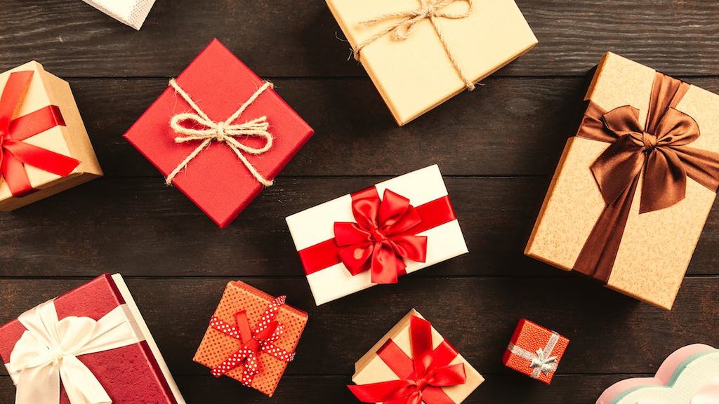 Wrapped presents laid out across the floor