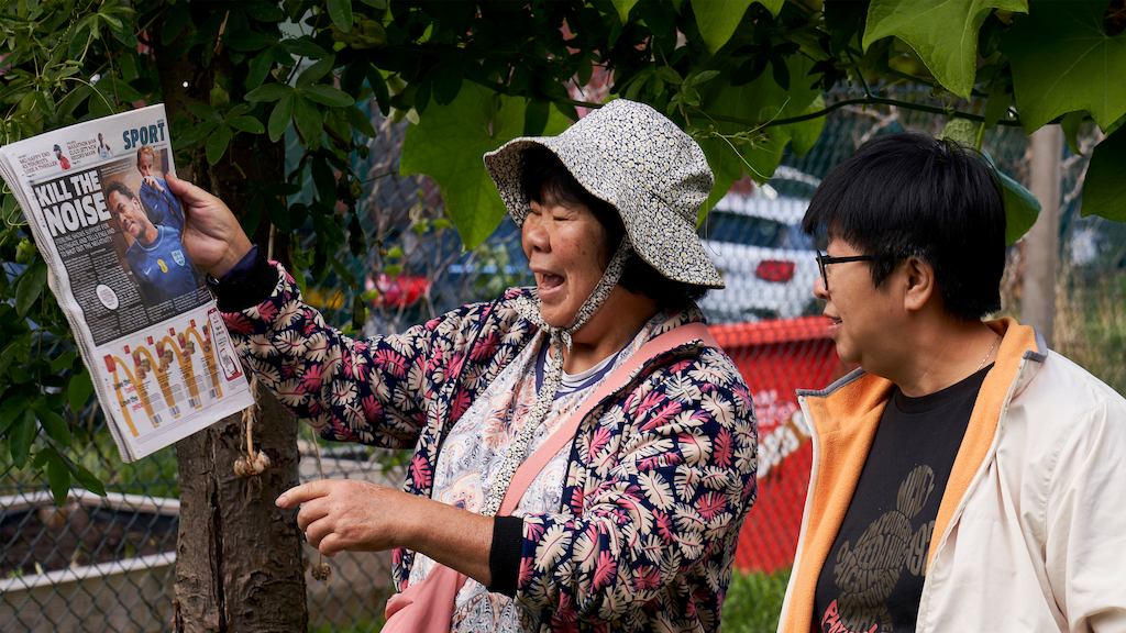 Two older women socialising outside